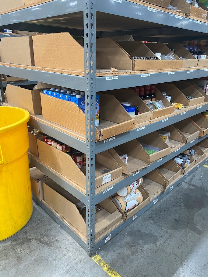 Industrial shelving supply in Los Angeles - shelves filled with food and other items in a warehouse